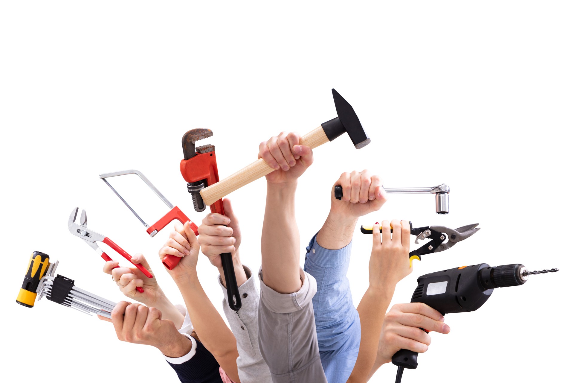 Group Of People's Hand Holding Carpentry Tools